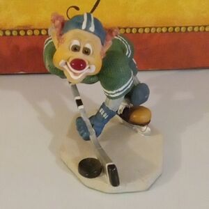 Vintage Hockey Playing Clown Decor